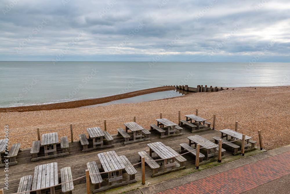 A view over the seafront at Eastbourne, with empty tables during low season A view over the seafront at Eastbourne, with empty tables during low season