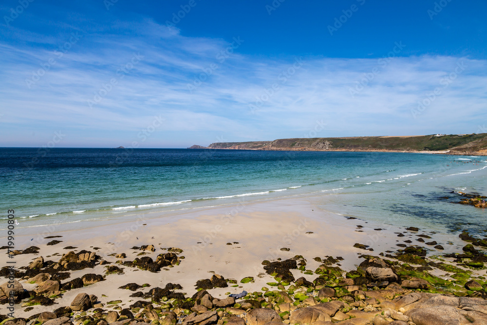 A view over the sandy beach at Sennen on the Cornish coast, on a sunny summer's day