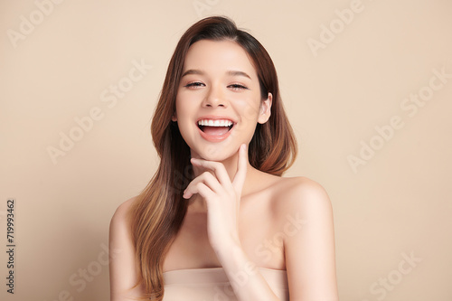 Beautiful smile of young asian woman with healthy white teeth on beige background, Dental care. Dentistry concept.