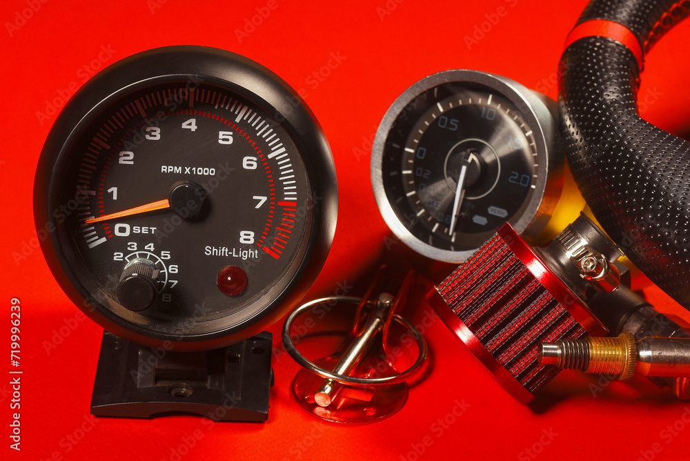 Tachometer and turbine oil pressure sensor close up. Sport car tuning