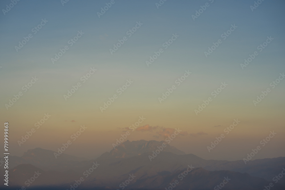 travel and people activity concept with twilight sky before sunset with layer of mountain travel and people activity concept with twilight sky before sunset with layer of mountain