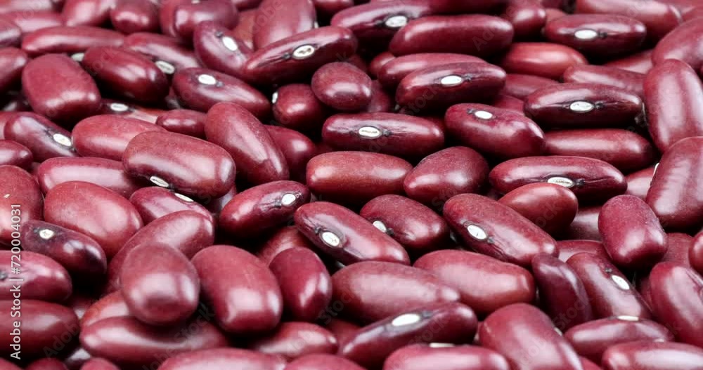 Video close up of red-brown kidney beans in rotating motion Video close up of red-brown kidney beans in rotating motion