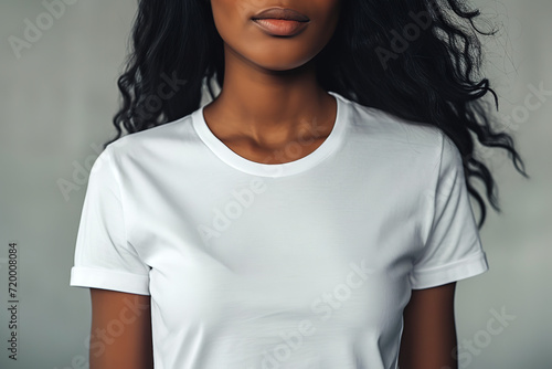 Mockup empty, an african american woman, with long hair, wearing white blank short sleeve t-shirt © Nate