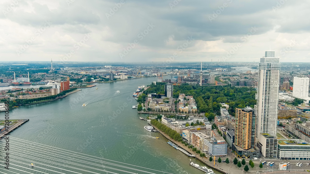 Rotterdam, Netherlands. View of the port. River Nieuwe Maas. Summer day, Rainy clouds, Aerial View