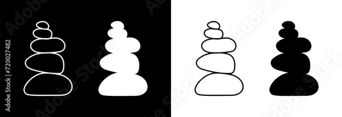 Stack of stones for a spa salon on a black and white background. Balance concept.