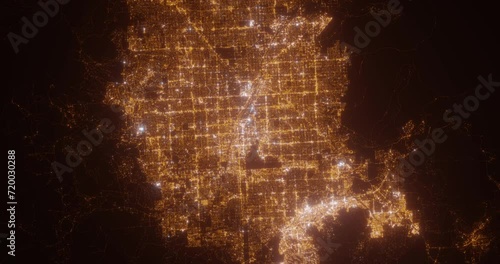 Las Vegas (Nevada, USA) aerial view at night. Top view on modern city with glow effect. Camera is zooming out, rotating counterclockwise