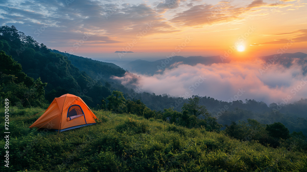 Tent Camping at Sunrise Amidst Mountain Fog