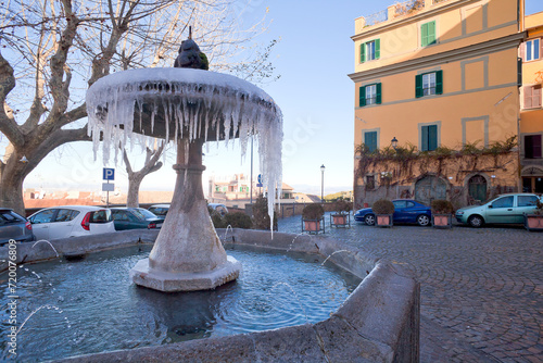 Frozen fountain in Piazza San Rocco - Frascati, Rome, Italy photo