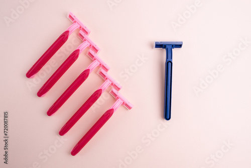 Disposable plastic razor with steel blade, men's and women's razors. Skin and body care concept. Depilation. Place for text