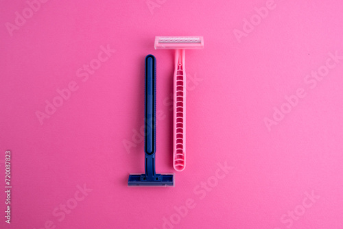 Disposable plastic razor with steel blade, men's and women's razors. Skin and body care concept. Depilation. Place for text photo