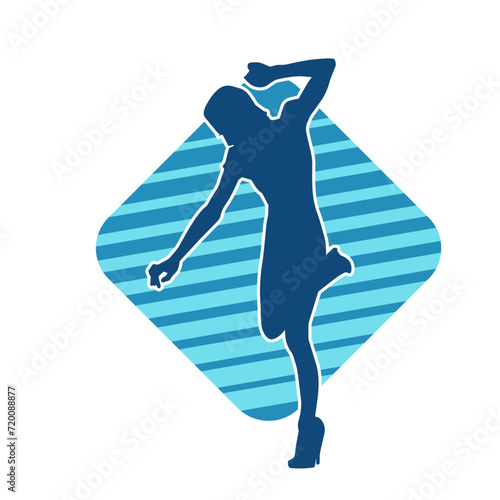 Silhouette of a slim female in dance pose. Silhouette of a woman dancing.