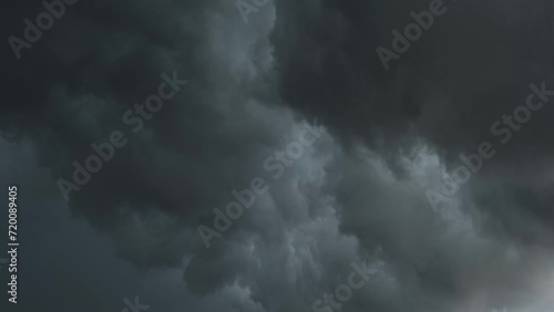 Dramatic dark storm clouds are moving fast, 4k photo