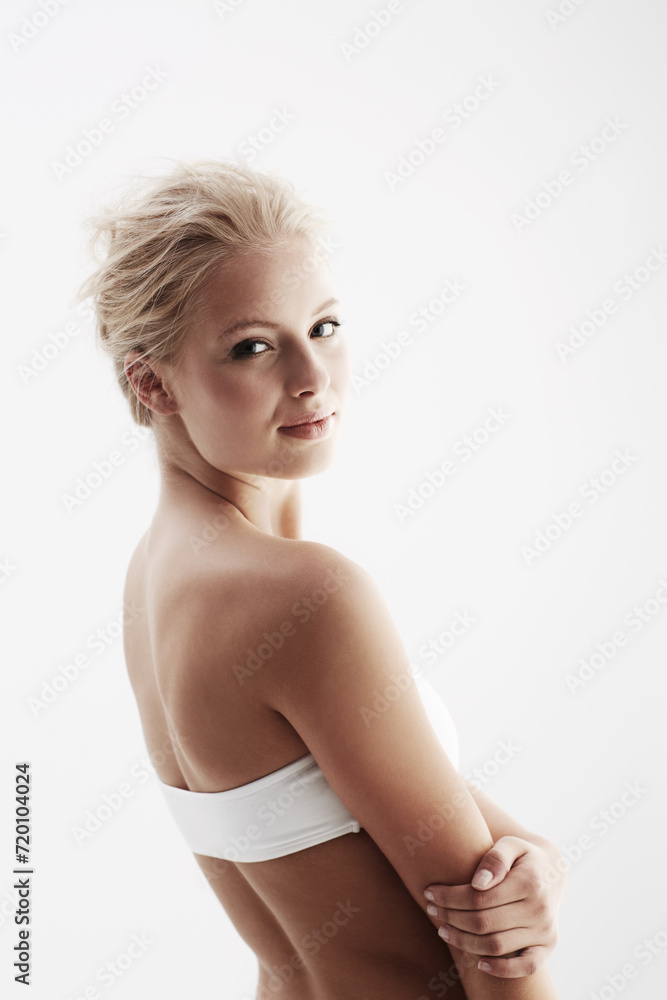 Obraz premium Young woman, portrait or lingerie in studio for fitness, confident or healthy body by white background. Blonde model, face or positive for skincare, feminine or happy with wellness for cosmetology