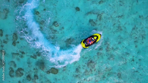 Maldives - Huraa Island - jet skiing in the blue lagoon photo