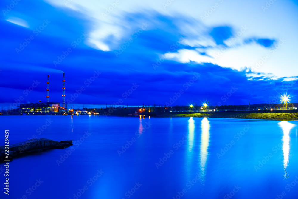 Large industrial port and large river at night