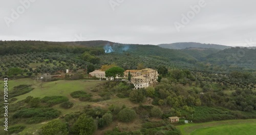 Wallpaper Mural Aerial view Bracciano Italy. Beautiful village landscape with orchards of olive trees and citrus trees in a mountain landscape. High quality 4k footage Torontodigital.ca