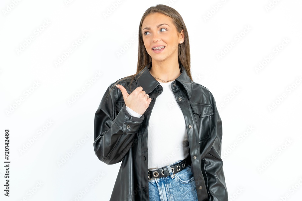 Charming Young beautiful woman looking at copy space having advertisements Charming Young beautiful woman looking at copy space having advertisements