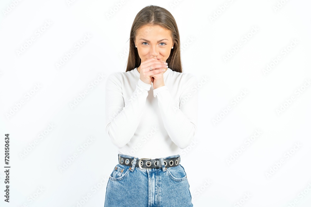 Young beautiful woman holding oneself, feels very cold outside, hopes that will not get cold Young beautiful woman holding oneself, feels very cold outside, hopes that will not get cold