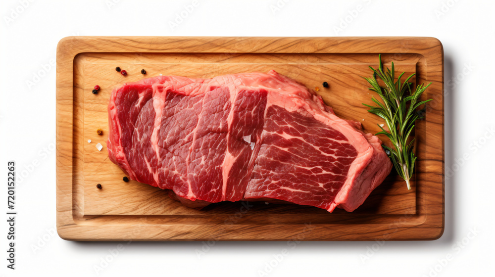Fresh beef steak on a wooden cutting board