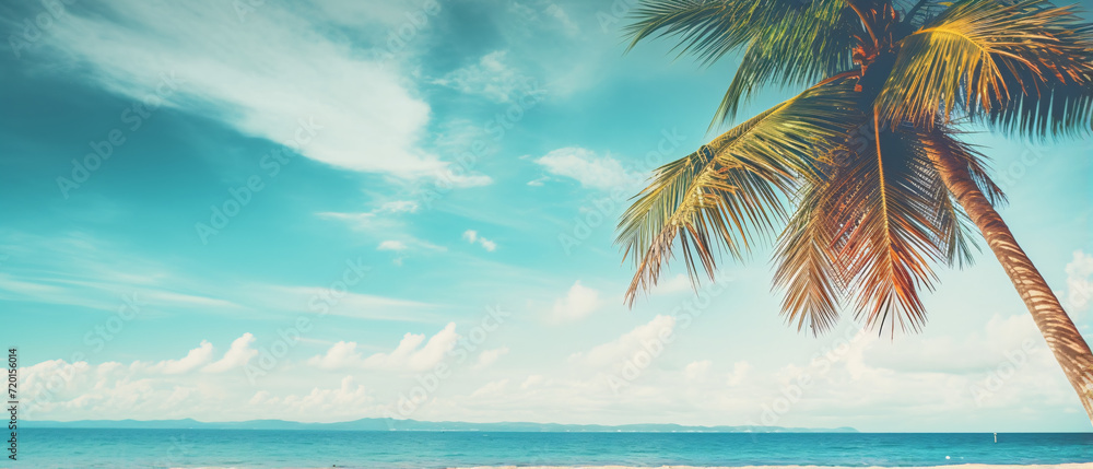 
A palm tree graces a tropical beach against a serene blue sky, capturing the essence of tranquil paradise and coastal beauty.