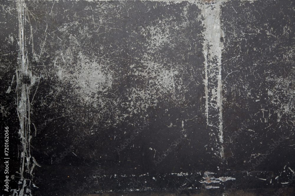 Obraz premium Weathered iron wall with seamless background of iron products