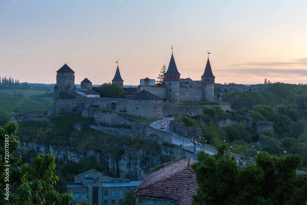 Evening view of mediaeval fortress in Kamianets-Podilskyi city, Ukraine.