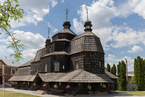 Medieval wooden Church of the Ascension in Chortkiv city, Ukraine photo