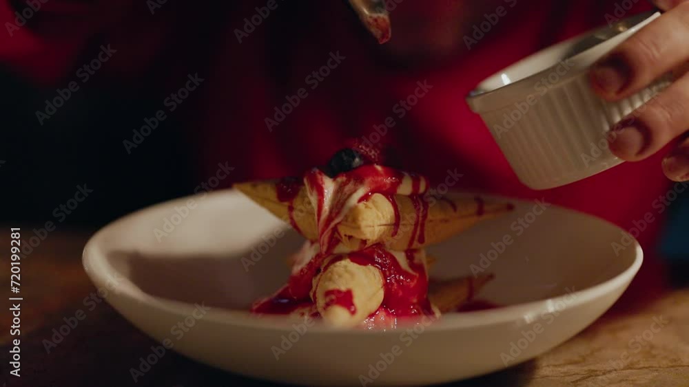 Chef Puts Berries On an Exquisite Dessert. Chef Puts Berries On an Exquisite Dessert.