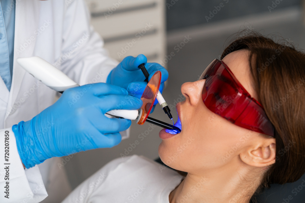Dentist and patient interaction at the office.