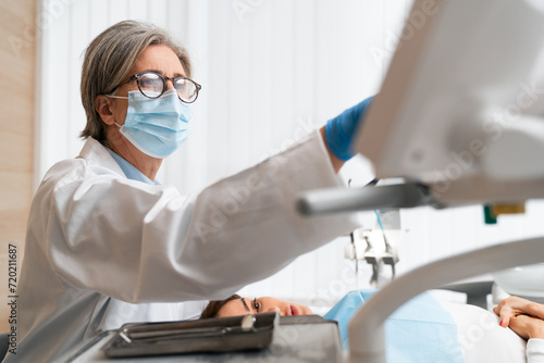 Fototapeta Naklejka Na Ścianę i Meble -   Dental check-up for a patient's teeth.