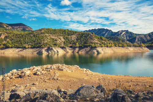 Mountain lake on a sunny autumn day. Oliana Reservoir, Lleida, Spain