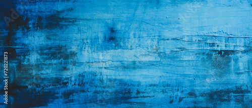 Bright blue abstract wall with textured, organic landscapes. Ideal for textured backgrounds, monochromatic depth, distressed surfaces, large canvas paintings, and realistic industrial textures photo