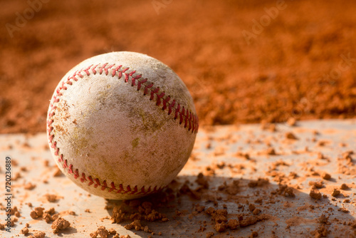red clay baseball field and various views of the baseball home plate
