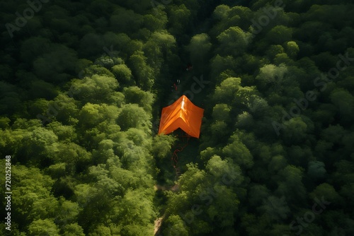 Canopy Comfort: Bird's Eye View of Serene Tent Camp Amidst Trees