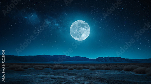The full moon over a desert