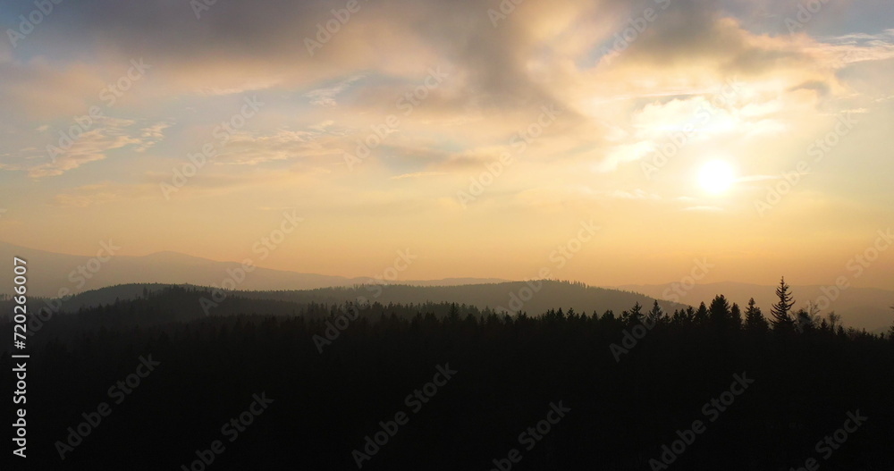 aerial view of woods and mountains in winter aerial view of woods and mountains in winter