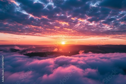 Beautiful sunrise cloudy sky from aerial view © Amer