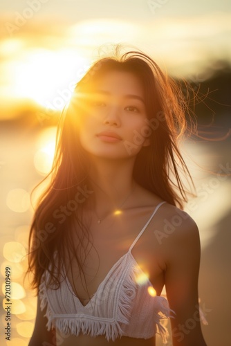 Portrait of a beautiful Asian woman at sunset