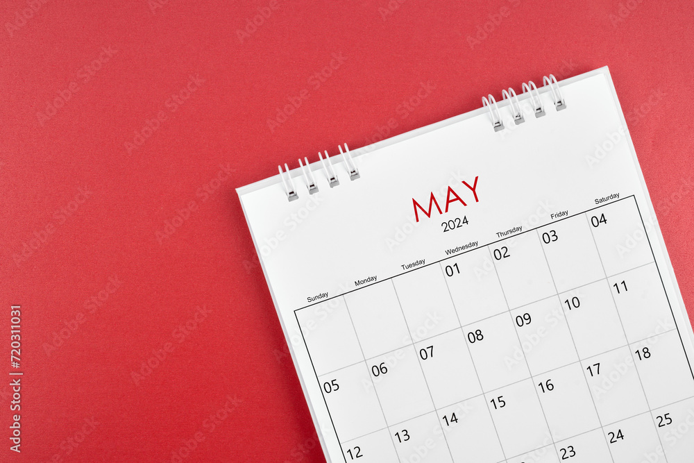 May 2024 desk calendar on red background. May 2024 desk calendar on red background.