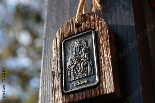 Virgin Mary and Jesus. Metal icon with wooden frame.