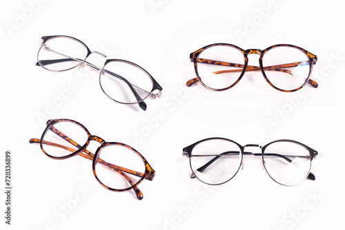 set of Reading glasses on white background.