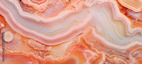 Closeup of cross section of different colorful abstract healing stone orange apricot crystal quartz texture background. photo