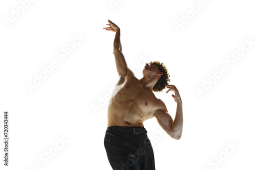 Contemporary dance choreographer and dancer freeze in moment of his performance against white studio background. Concept of art, human motions, wellness, natural beauty of male body.