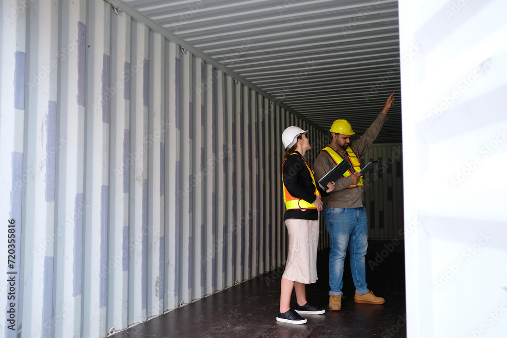 Employee working at shipping container