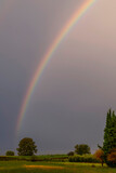 A rainbow over the Tuscan countryside in Fauglia, Pisa, Italy