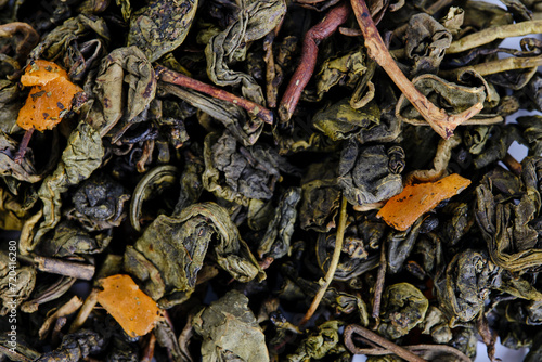 Black and green leaf tea with fruits and berries.
