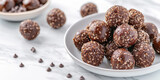 Dessert Bourbon Balls on marble Background, copy space. Delicious bourbon balls coated with confectioners' sugar.