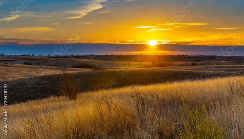 Golden Sunset Over Serene Prairie Landscape