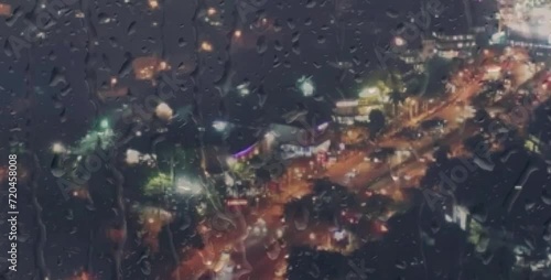 Wallpaper Mural the atmosphere and condition of the road with passing vehicles seen from behind glass that is wet from rain Torontodigital.ca