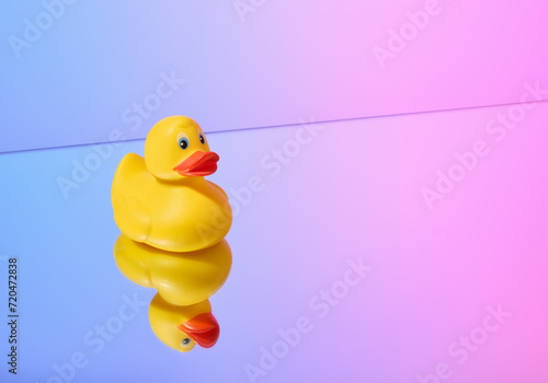 Yellow rubber duck and bath toy. Copy space for text.